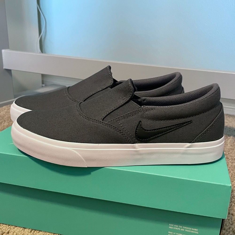 BRAND NEW in Box Nike SB Charge Slip. Sz Men’s 8.5, Women’s 10. Grey